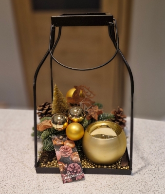 Black and gold lantern with candle holder